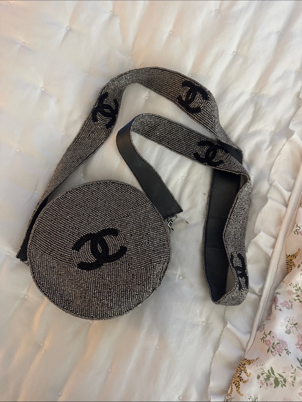 Elegant Round Shoulder Bag in Black and Silver with Logo Strap